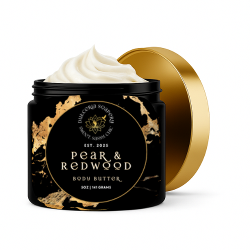 Jar of Pear & Redwood body butter with a gold lid on a white background