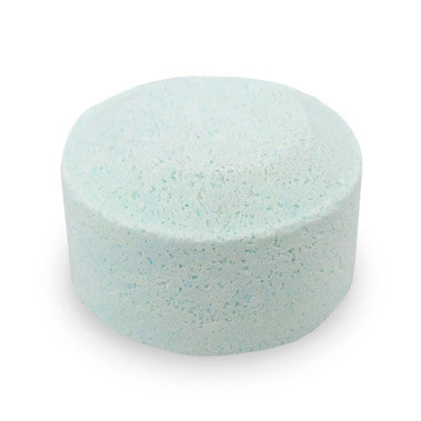 Round, light blue sponge on a white background