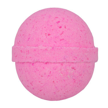 Pink bath bomb with speckled texture on a white background