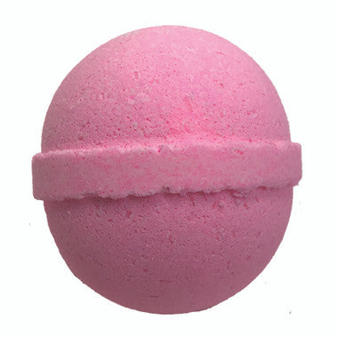 Pink bath bomb on a white background