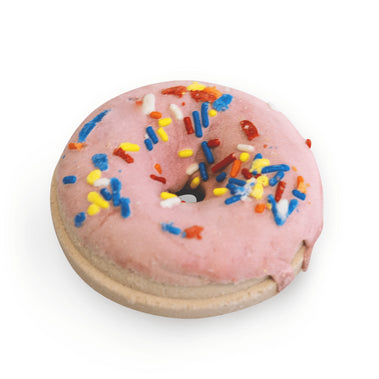 Pink frosted donut with colorful sprinkles on a white background
