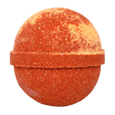 Orange bath bomb on a white background