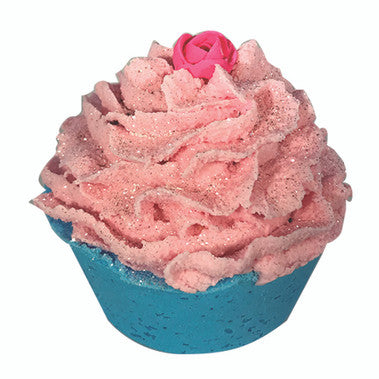 Pink bath bomb with a blue base and pink rose on a white background