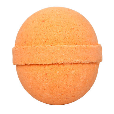 Orange bath bomb on a white background