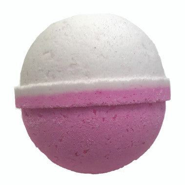 Bath bomb with pink top and bottom on a white background