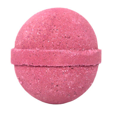Pink bath bomb with speckled texture on a white background