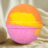Colorful bath bomb on a beige fabric background