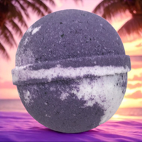 Bath bomb with a sunset and palm trees in the background