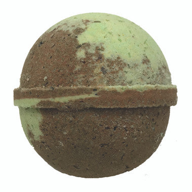 Round, brown and green bath bomb on a white background