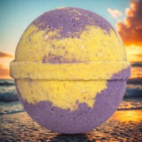 Bath bomb with a colorful gradient on a beach at sunset