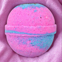 Colorful bath bomb on a pink background