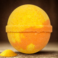 Yellow and orange spherical object on a brown background