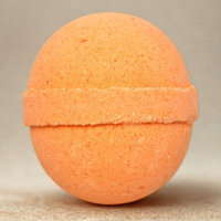 Orange ball on a beige background