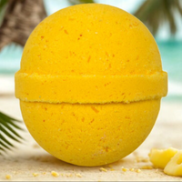 Yellow ball with a textured surface on a wooden surface