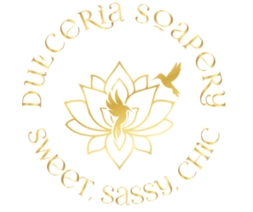 Logo of Dueceria Soapery with gold text and a floral design on a white background