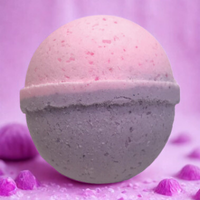 Bath bomb with purple and pink colors on a matching background